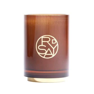 D’Orsay Out of Sight 23:15 Handblown Refillable Candle – floral leather candle with heliotrope, lavender, sandalwood, patchouli, vanilla and amber.