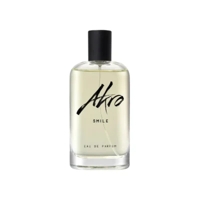 AKRO Smile Eau de Parfum—bergamot, raspberry, and clary sage with musk in a bright, aromatic-fruity unisex fragrance.