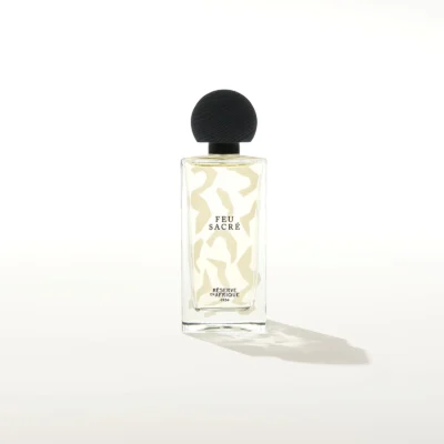 Feu Sacré by Réserve en Afrique perfume bottle – smoky amber woody fragrance with incense, myrrh, and sandalwood evoking sacred warmth and quiet power.